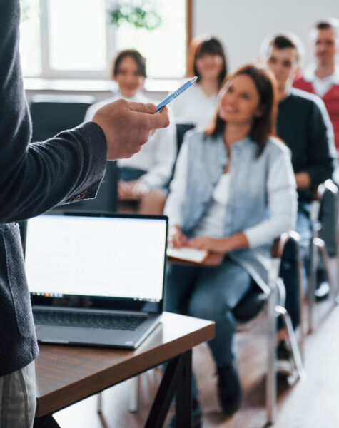 everyone-is-smiling-listens-group-people-business-conference-modern-classroom-daytime