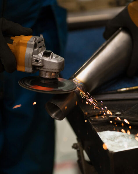 technician-worker-cutting-metal-with-many-sharp-sparks-using-equipments-cat-iron